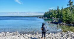 woman at the bruce peninsula national park overlooking water view